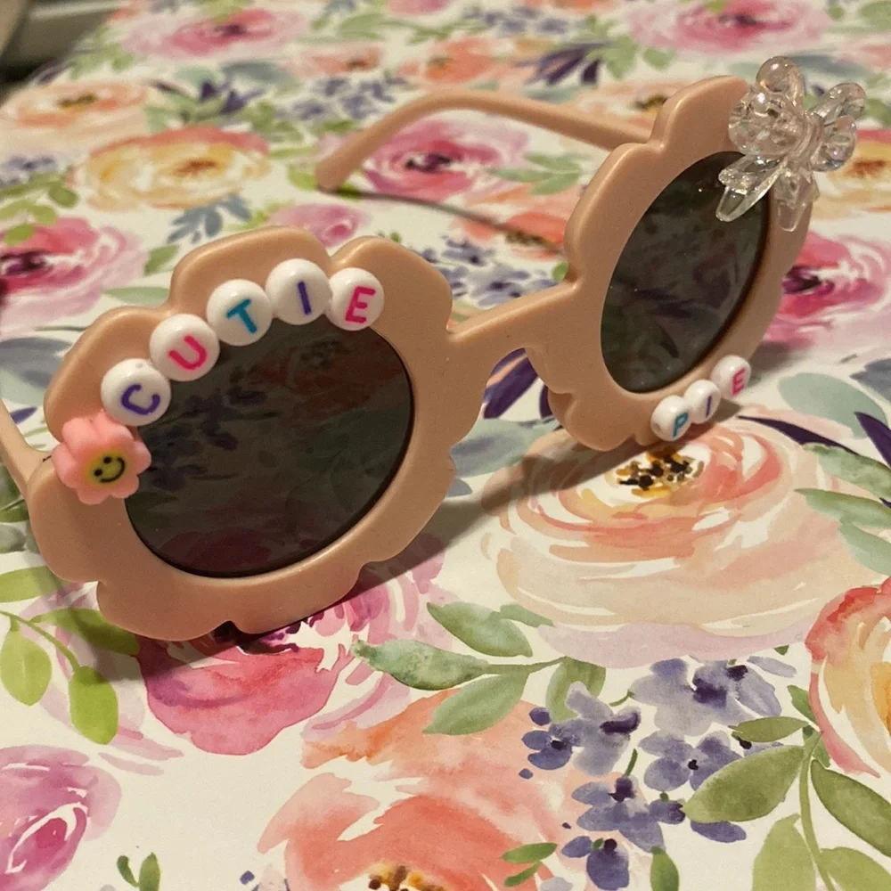 Girls light pink flower shaped cutie pie sunglasses